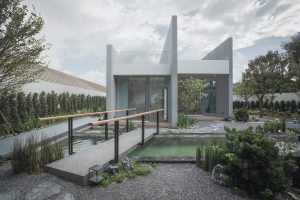 معماری ویلای مینیمال با استفاده از سنگ و بتن